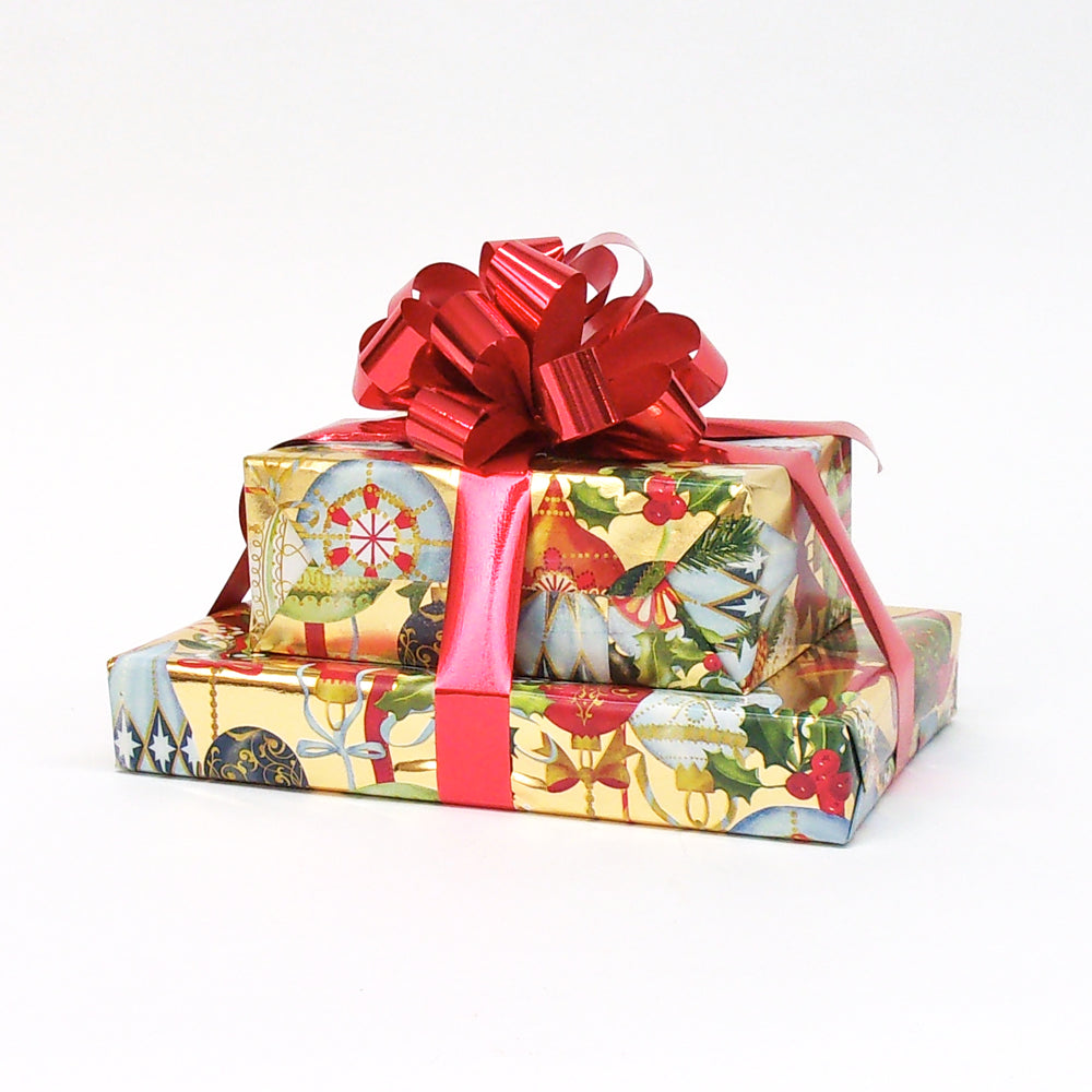 Decorative gift box with a red ribbon on a white background