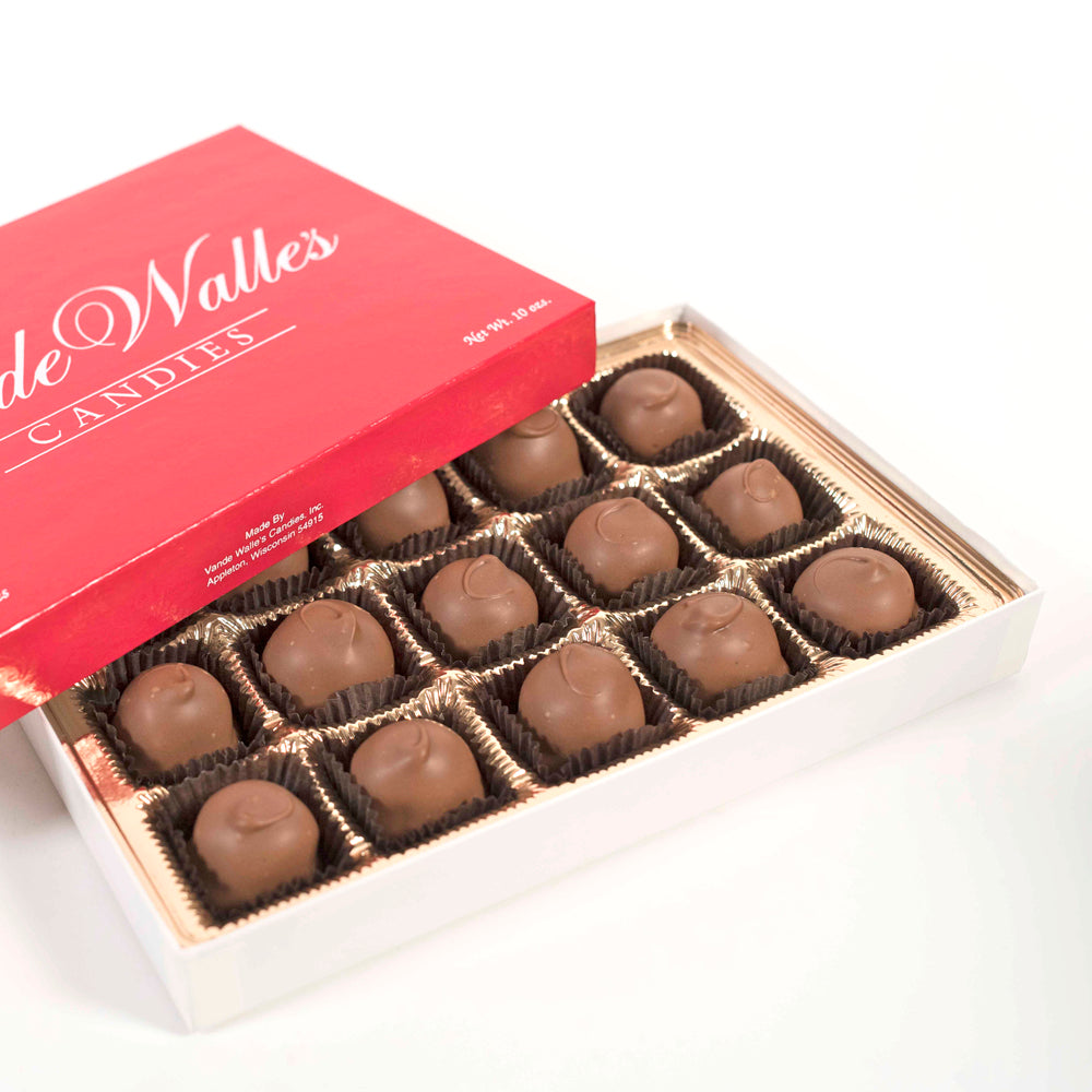 Box of cordial cherries with a red lid featuring 'Vande Walles Candies' logo in white.